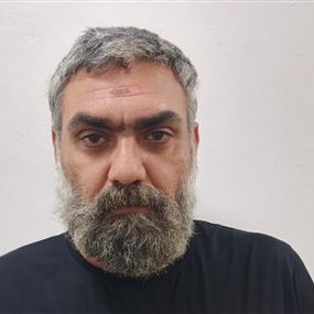 تعميم صورة موقوف بجرم استيلاء على متجر والاشتباه بفرض 