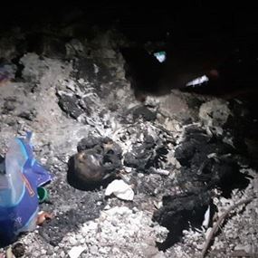 بالصورة: جثة محروقة داخل كيس في عدلون