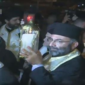 بالفيديو: لحظة وصول شعلة النور المقدس الى بيروت